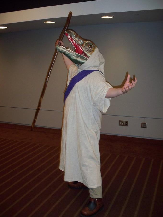 Raptor Jesus cosplay with staff